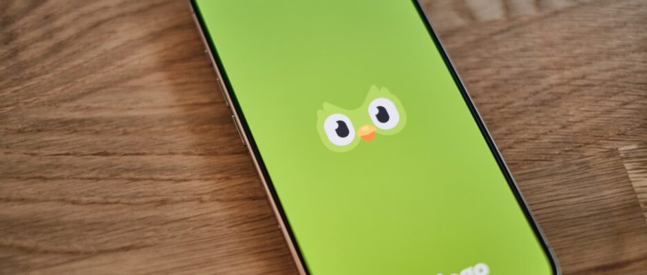 a-green-phone-with-a-face-drawn-on-it